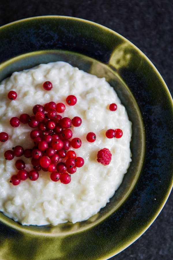 Colourful breakfast bowl with fresh berries and yogurt